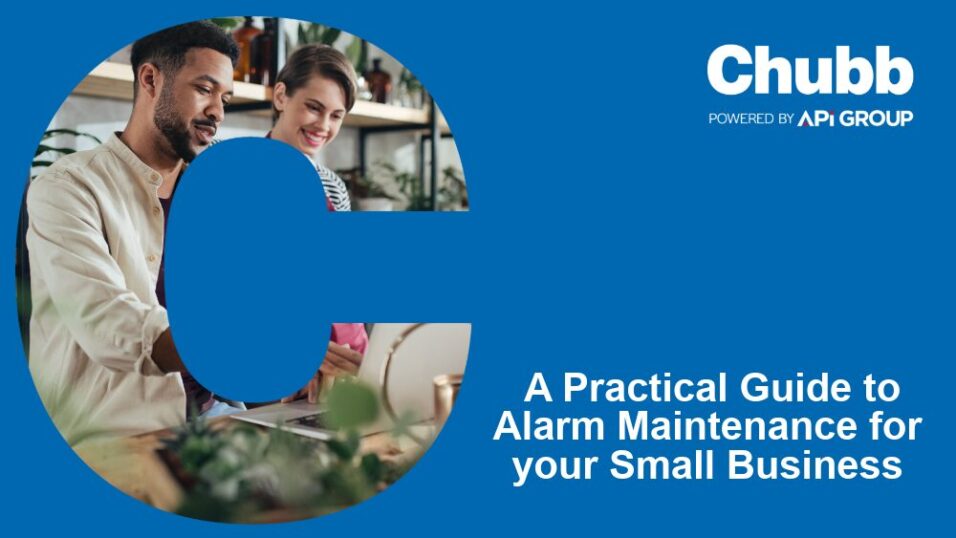 Two people work together at a laptop in a modern workspace, framed inside a large blue “C”. To the right, the Chubb and API Group logos appear above the title “A Practical Guide to Alarm Maintenance for your Small Business.